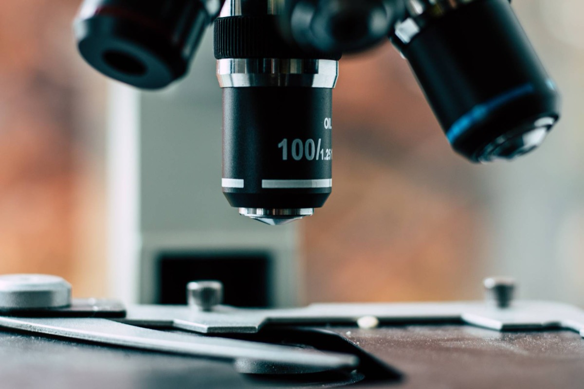 Close-up of a microscope in use during sample analysis
